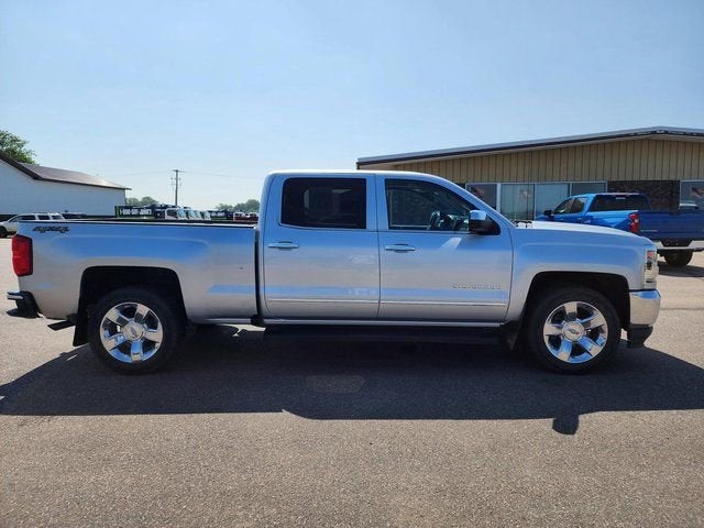 2018 Chevrolet Silverado 1500 LTZ in Silver Ice Metallic — front three-quarter view