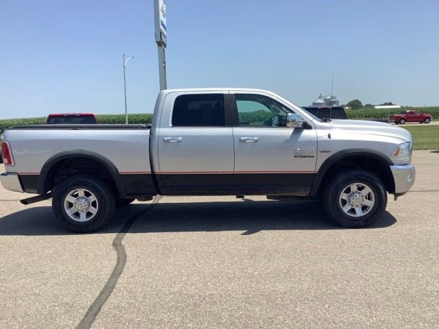 2014 RAM 2500 Laramie in Silver Ice Met — front three-quarter view